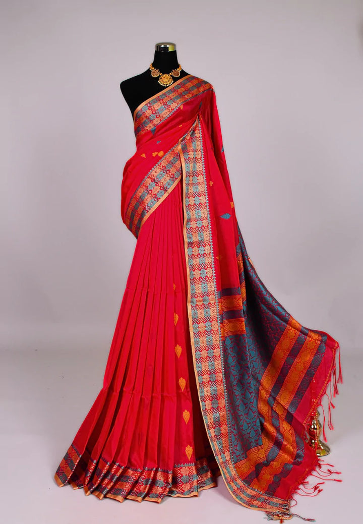 Navy blue plain mercerised cotton saree, contrast traditional border of peacock, and elephant motifs, striped pallu, and a matching blouse main image 1